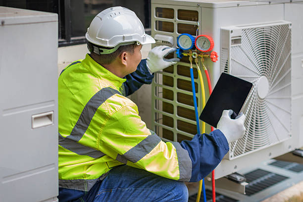 Professional Ductwork Repair technician working in Stow, MA